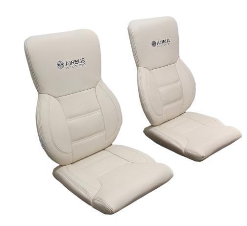 H125 classic crew seat assembly with aviation-grade leather and Genlite foam, Generation II ergonomic design for helicopter cockpit interiors.