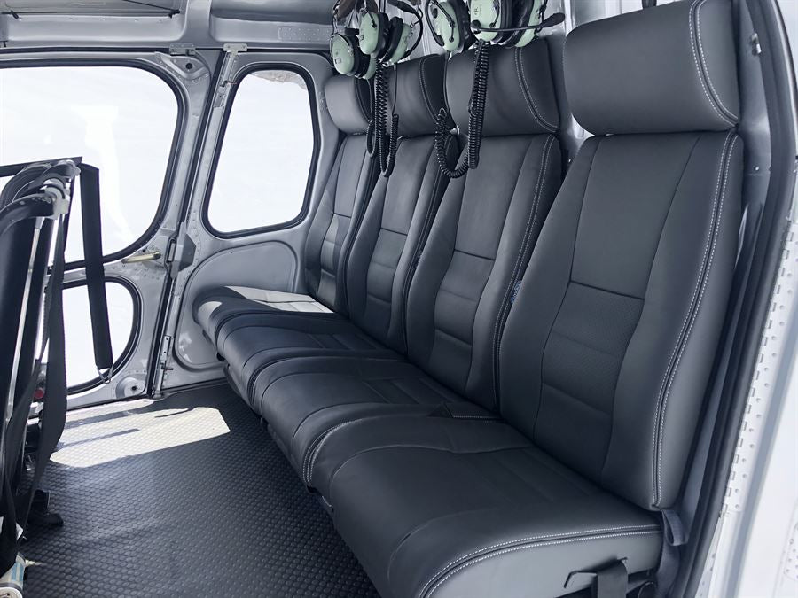 AS350/H125 standard rear passenger seat set with aviation-grade leather and Genlite foam, Generation I design for high-use helicopter interiors.