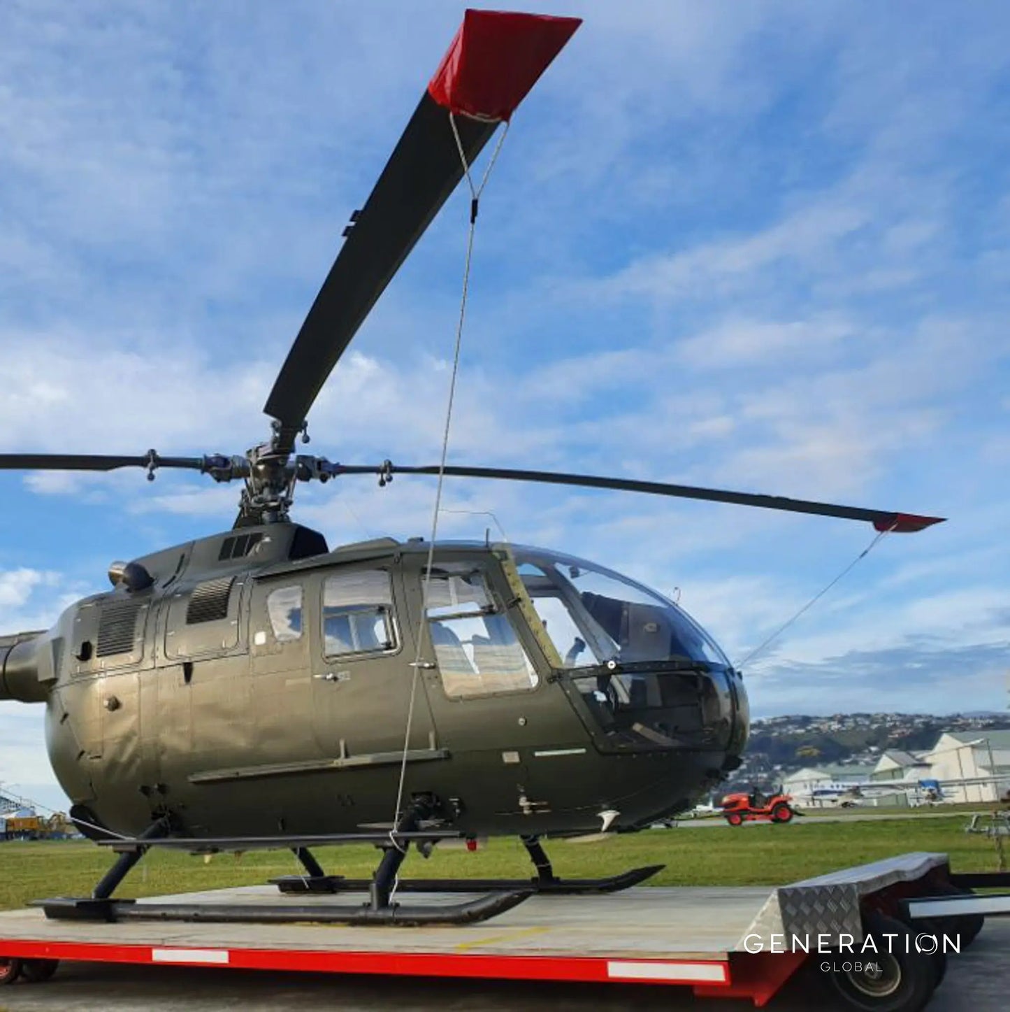 BO 105 helicopter rotor tie-down kit – red PVC with webbing straps and braided rope, includes blade and tail rotor restraints.
