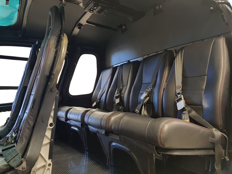AS350/H125 standard rear passenger seat set with aviation-grade leather and Genlite foam, Generation I design for high-use helicopter interiors.