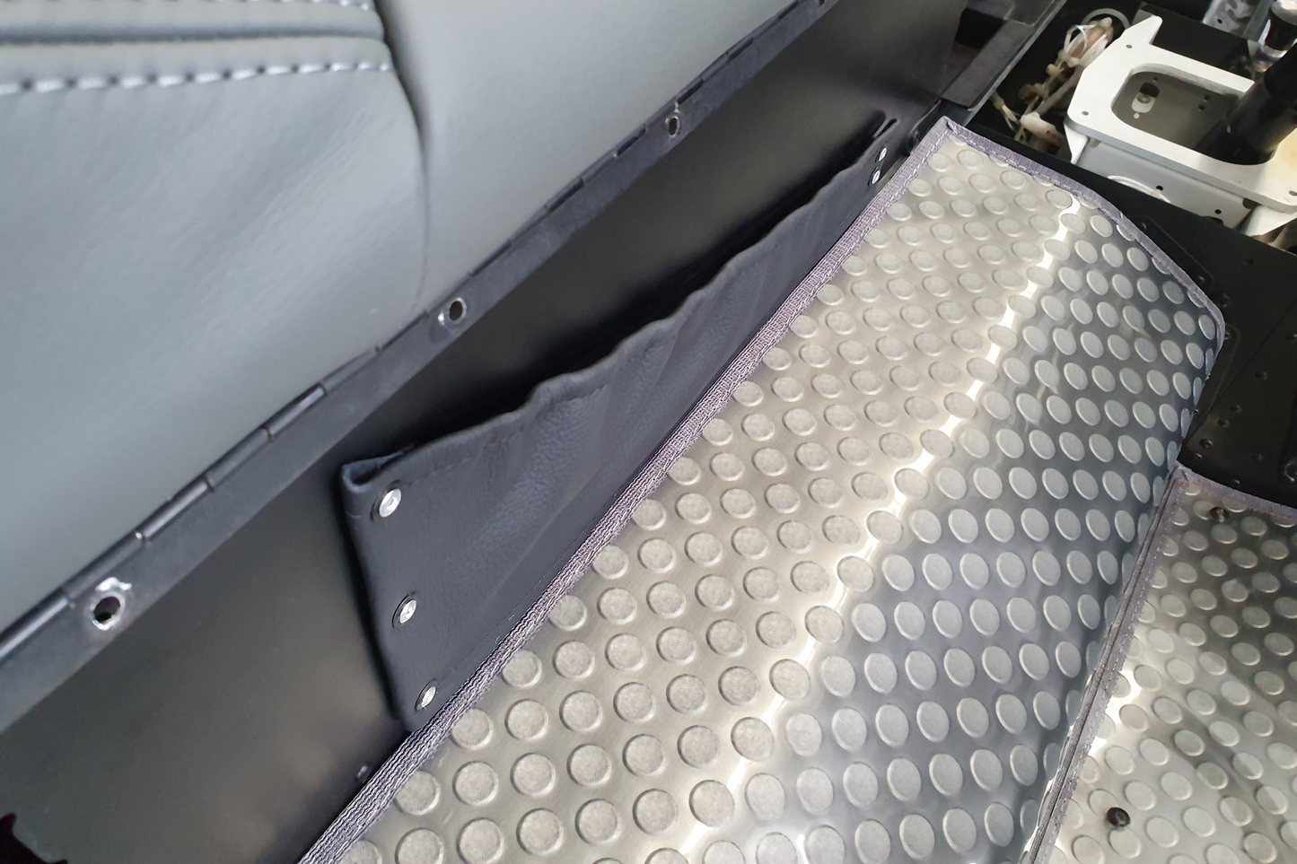 Durable black leather seat pocket for R66