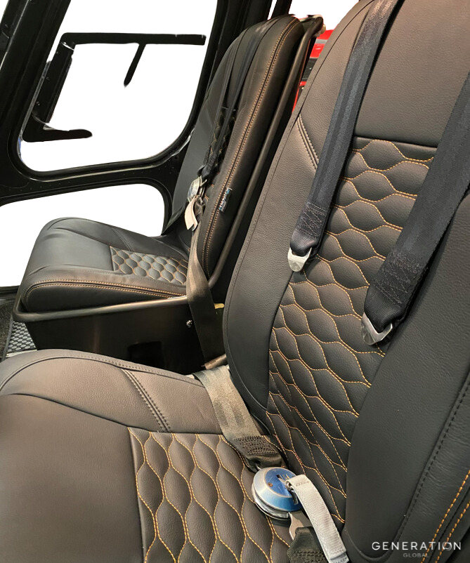 AS350/AS355/H125 executive crew seat assembly with aviation-grade leather and Genlite foam, Generation III design for luxury helicopter interiors.