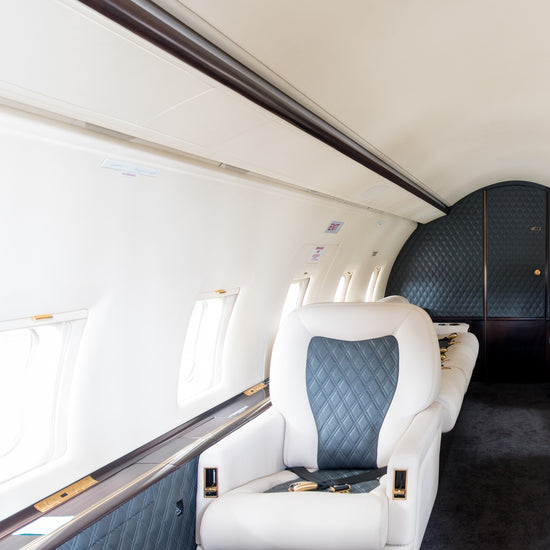 Custom-designed jet interior featuring premium materials and finishes