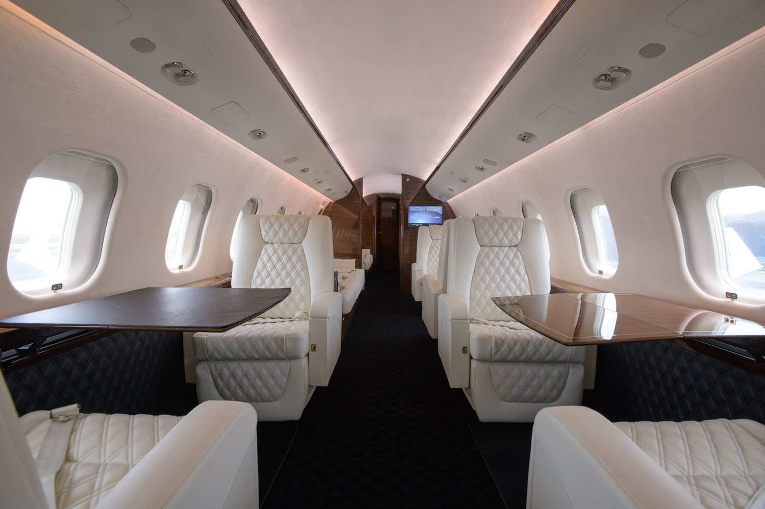 Custom-designed jet interior featuring premium materials and finishes