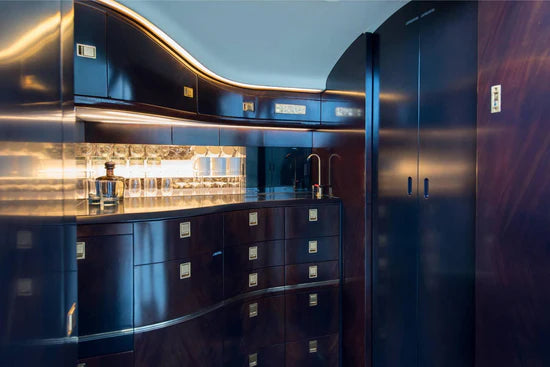 Luxurious VIP private jet cabin with bespoke Hard surfaces and plating