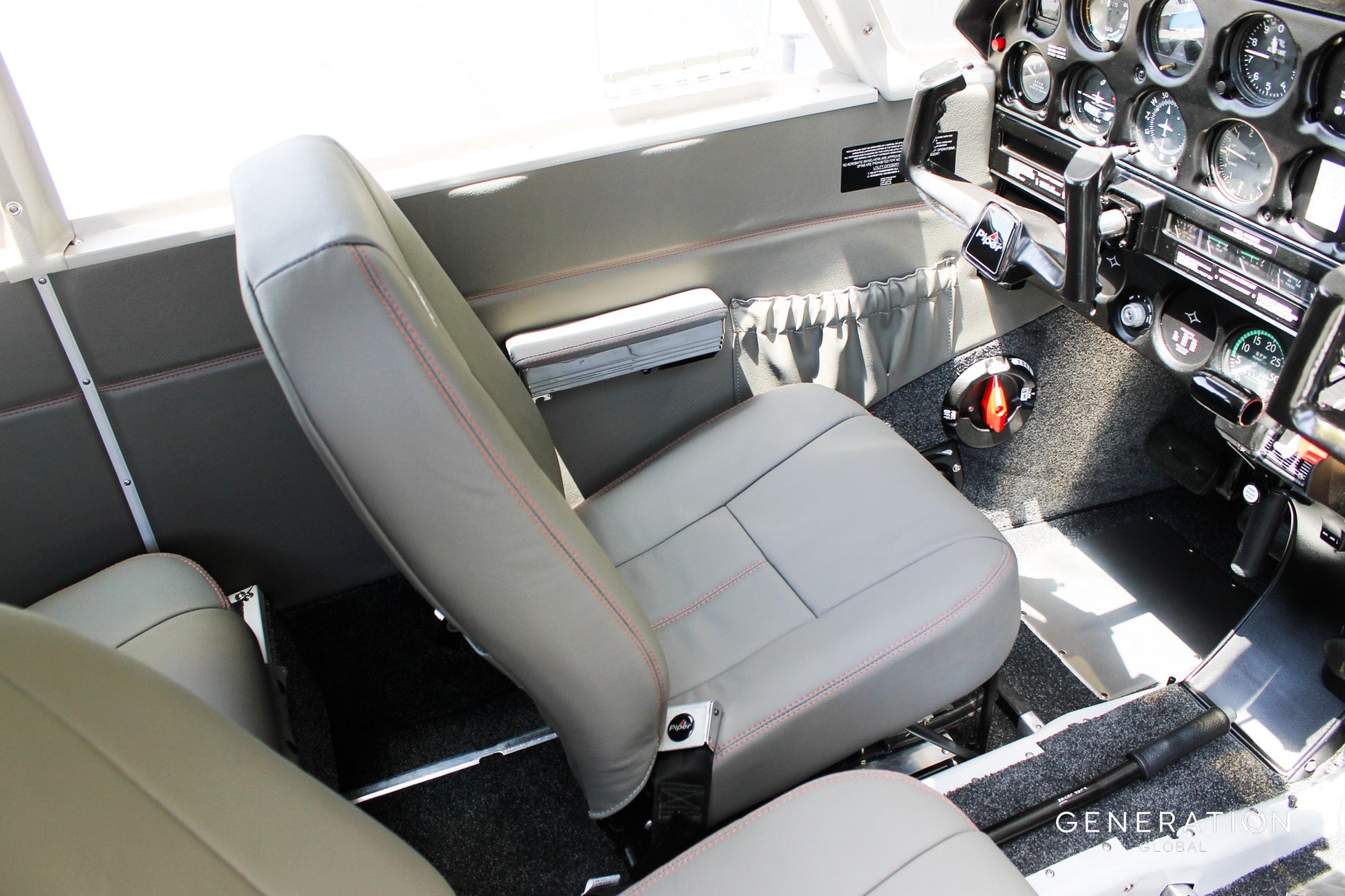 Complete Piper PA-28-140 replacement seat assembly including leather backrest covers, bottom covers, Genlite foam cushions and seat diaphragms.
