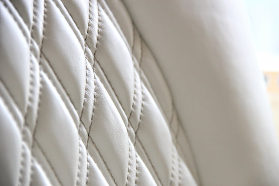 Custom-designed jet interior featuring premium decretive stitching