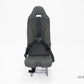 H130 helicopter seat assembly with leather-covered backrest and bottom cushions, Genlite foam, FAA and EASA approved.