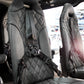 H130 helicopter seat assembly with leather-covered backrest and bottom cushions, Genlite foam, FAA and EASA approved.