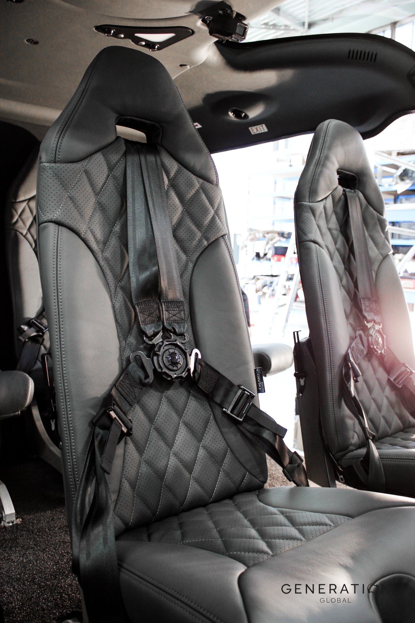 H130 helicopter seat assembly with leather-covered backrest and bottom cushions, Genlite foam, FAA and EASA approved.