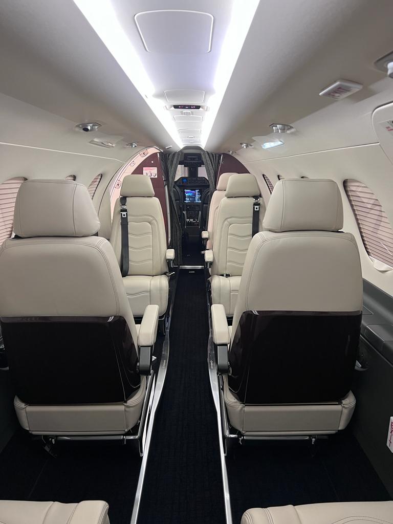 Custom-designed jet interior featuring  Embraer Phenom 300 Aircraft Interior